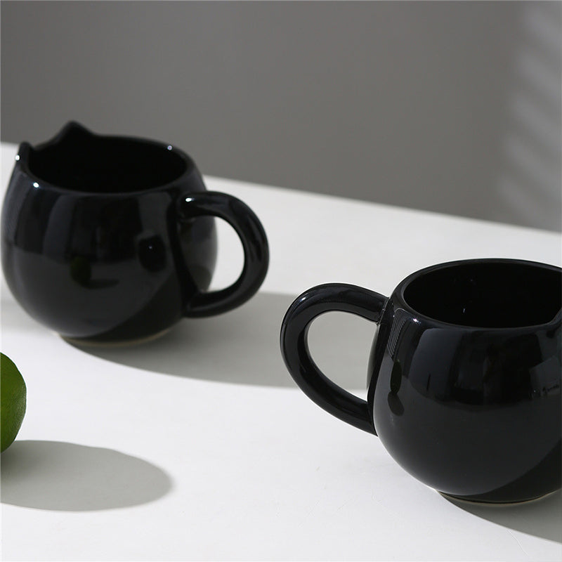 Adorable hand - painted cat - shaped ceramic mug, perfect for coffee or tea. - Korvel