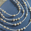 Collier en perles de verre en acier titane