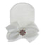 Chapeau en tricot rayé rose scintillant pour bébé avec un grand nœud