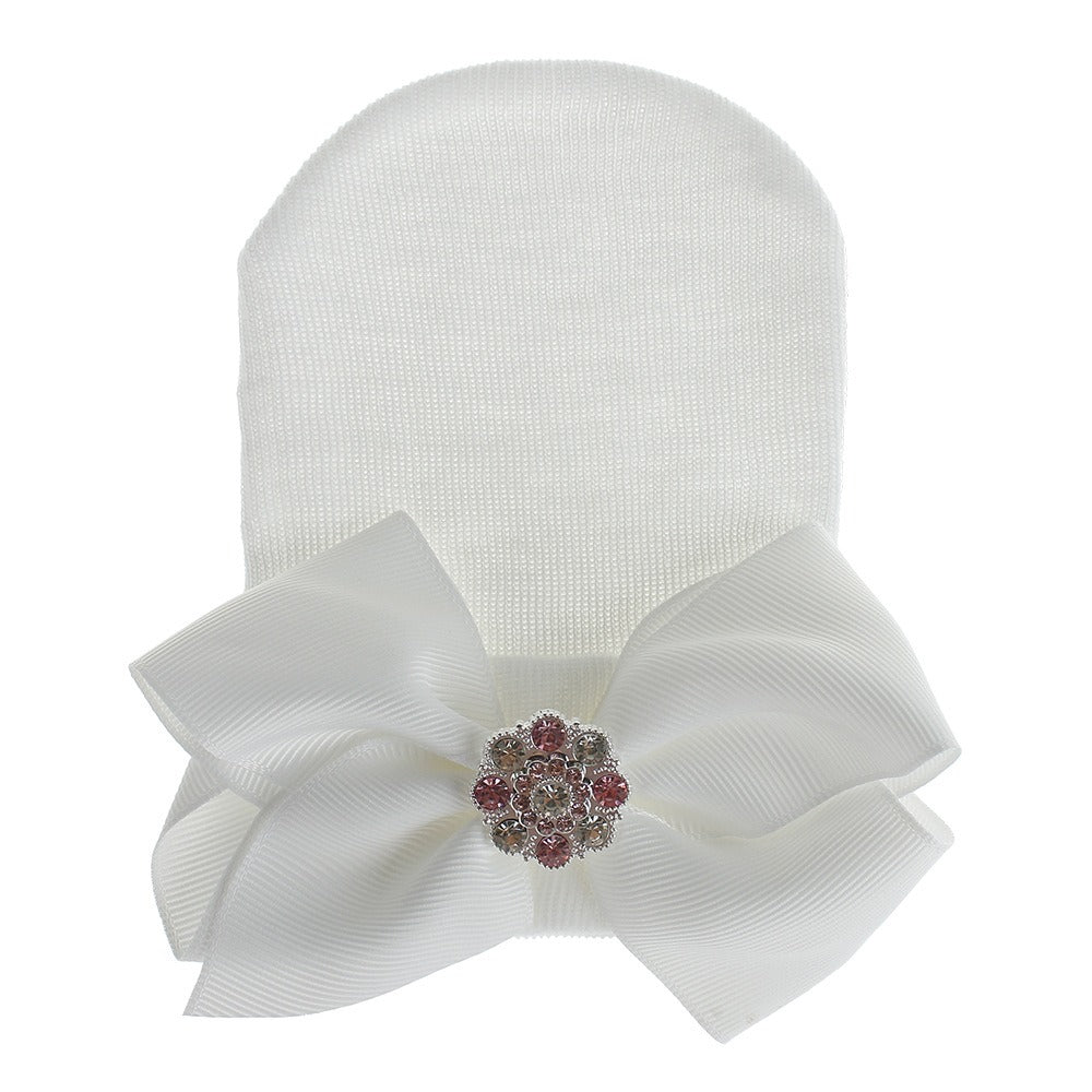 Chapeau en tricot rayé rose scintillant pour bébé avec un grand nœud