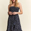 Robe tube florale smockée avec poches pour l'été