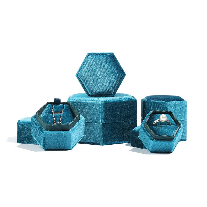 Boîte à bijoux en velours hexagonale élégante