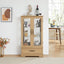 Light colored glass cabinet with adjustable glass frame, including cabinet light bulbs OAK with 2 doors and 1 drawer - Korvel