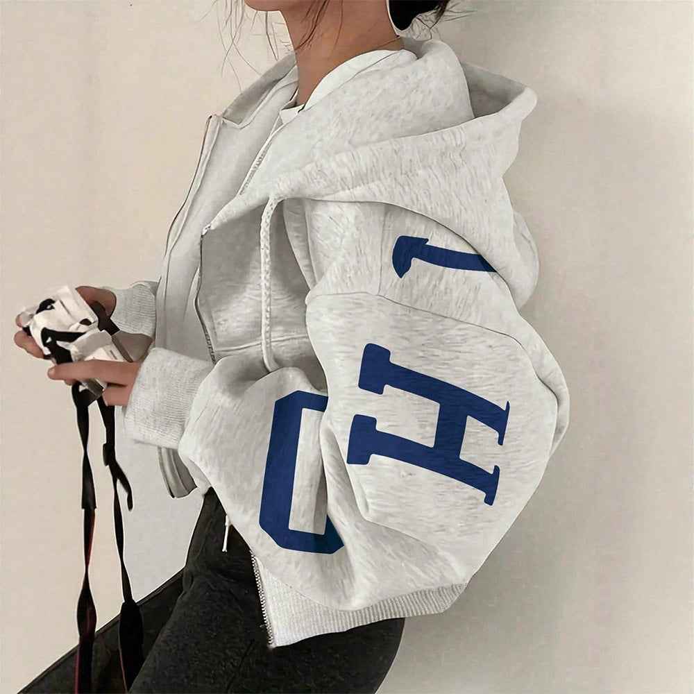 Sudadera con cremallera de manga larga y corte relajado para mujer