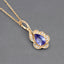 Colgante de Oro Amarillo de 14K con Tanzanita y Diamantes de 0.40 Quilates