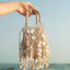 Elegant French-Style Woven Bucket Bag with Tassels