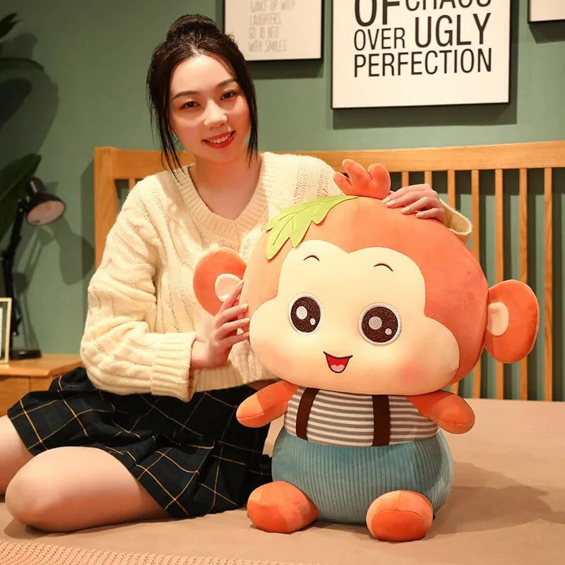 Jouets en peluche singe assis charmants pour tous les âges