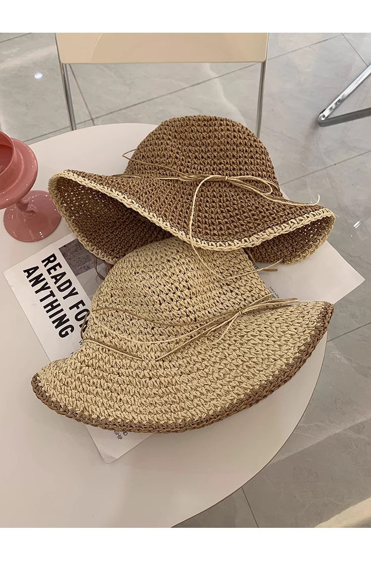 Chapeau en paille à large bord et résistant au soleil pour les sorties à la plage