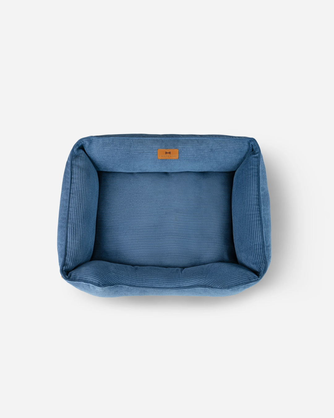 Cama para perros de terciopelo azul lujosa