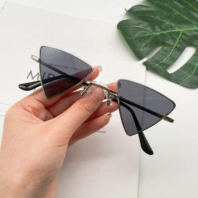 Lunettes de soleil élégantes sans monture en forme d'œil de chat pour un look stylé