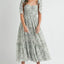 Robe midi froncée à buste floral avec lien d'épaule