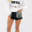 Sudadera suelta con parches de letras de felpa