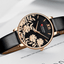 Montre élégante pour femmes étanche avec design de fleurs en découpage