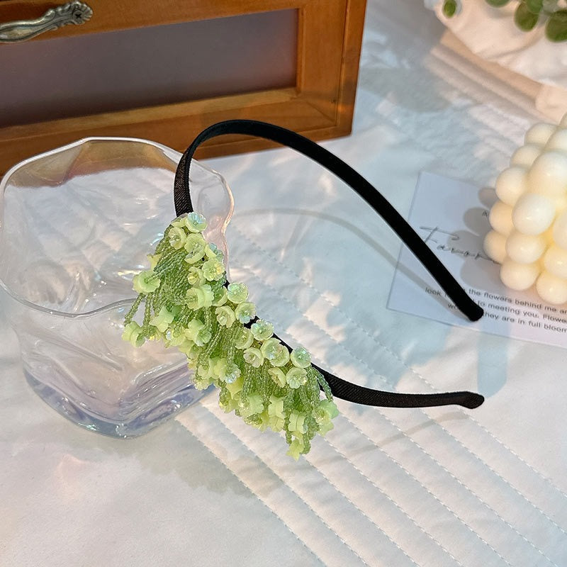 Handmade rice bead tassel flower side hair hoop for women - Korvel
