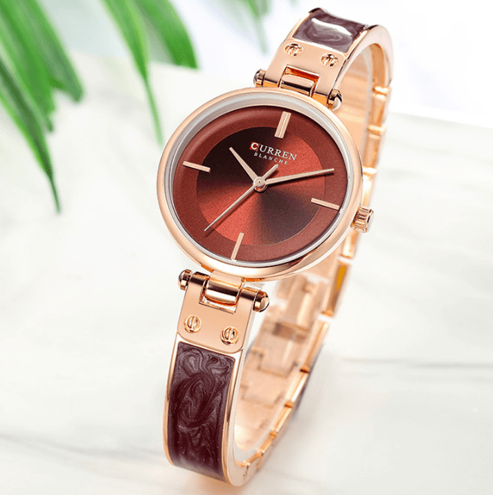 Montre en acier inoxydable élégante pour femmes avec bracelet en céramique