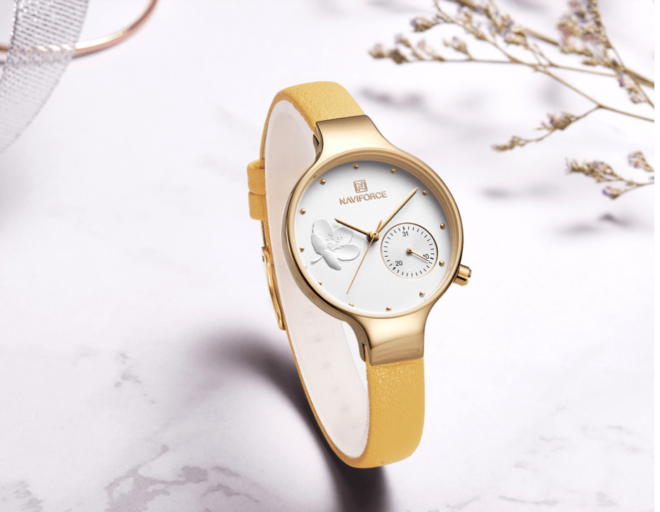 Montre analogique à quartz élégante pour femmes avec bracelet en cuir