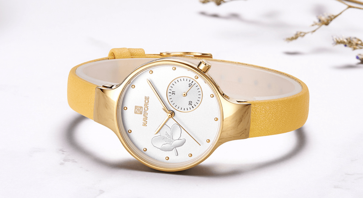 Montre analogique à quartz élégante pour femmes avec bracelet en cuir