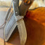 Artisan Crafted Damascus Steel Hunting Knife with Sheep Horn Grip and Engraved Guard - Korvel