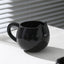 Adorable hand - painted cat - shaped ceramic mug, perfect for coffee or tea. - Korvel