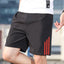 Shorts de sport pour hommes à séchage rapide à trois bandes