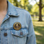 Bouton de revers de division d'anniversaire exécutif