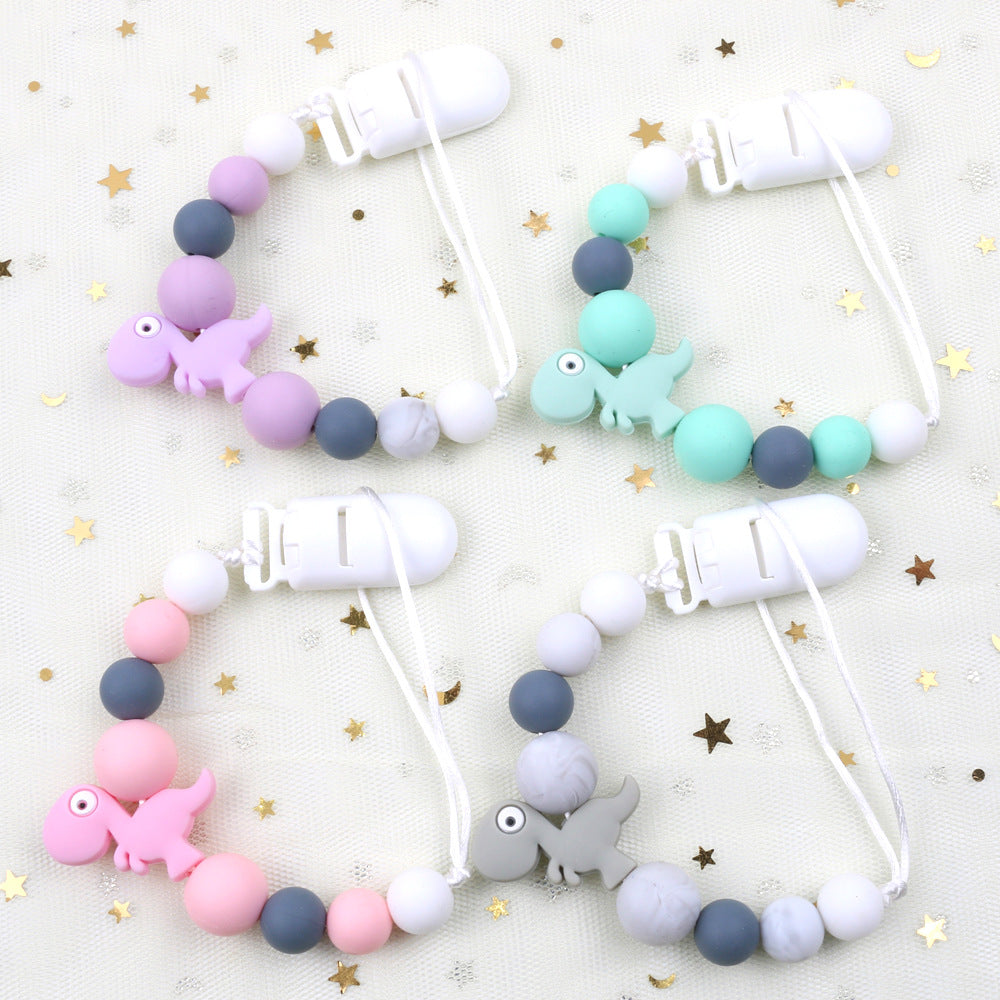 New baby pacifier chain clip teeth glue toy anti-drop chain silicone dinosaur pacifier chain baby products - Korvel