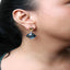 Pendientes colgantes elegantes de oro de 18 quilates con diamantes y piedras preciosas