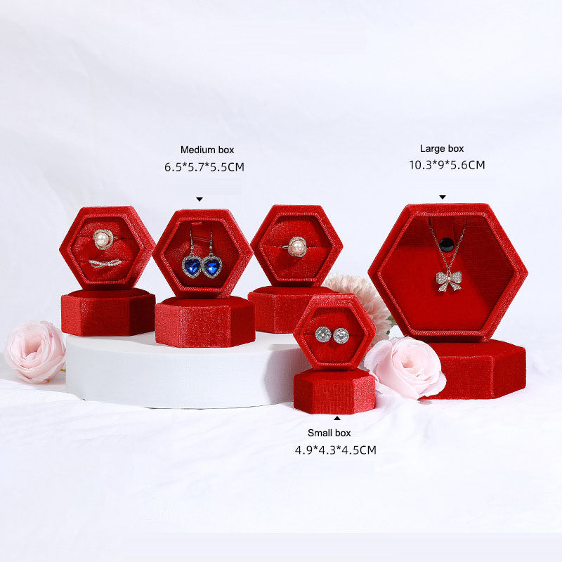 Boîte à bijoux en velours hexagonale élégante