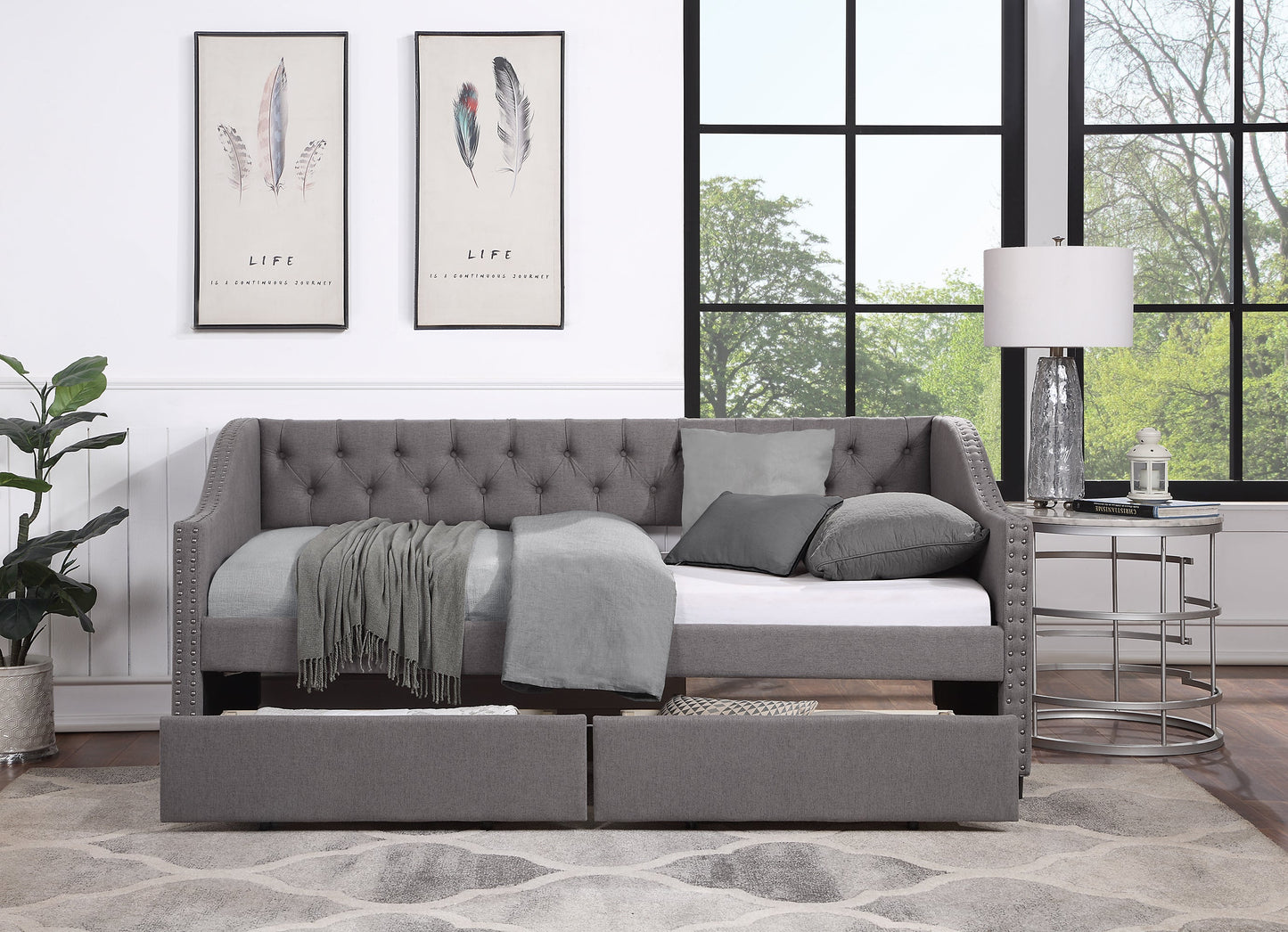 Cama nido tapizada de tamaño individual con dos cajones - Gris