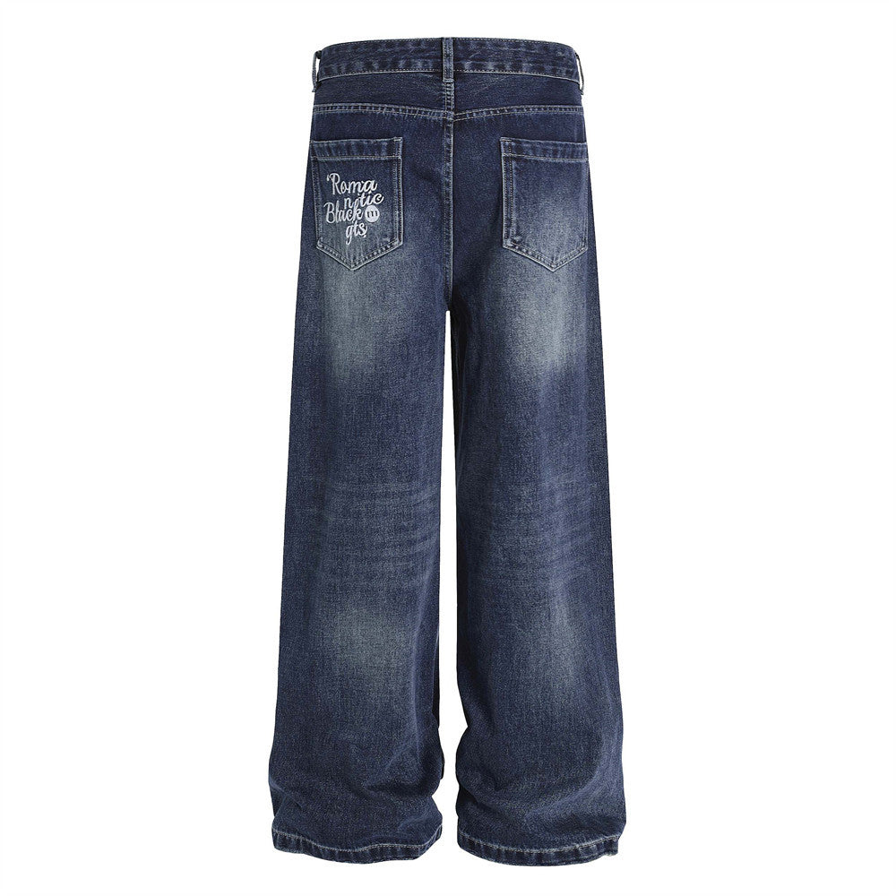 Pantalones de mezclilla de pierna ancha bordados con flores para hombres