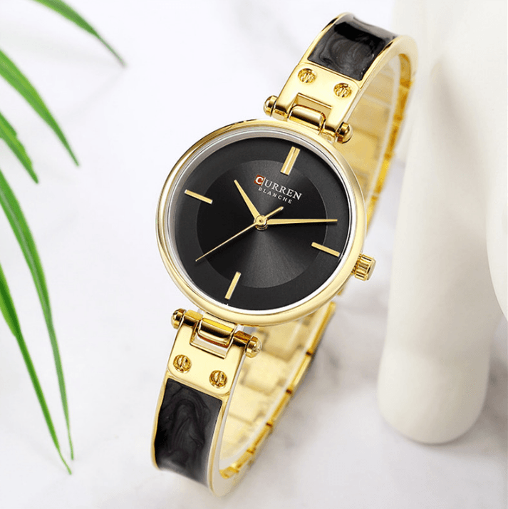 Montre en acier inoxydable élégante pour femmes avec bracelet en céramique