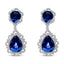 Boucles d'oreilles pendantes en or blanc 18K avec saphirs bleus et halo de diamants