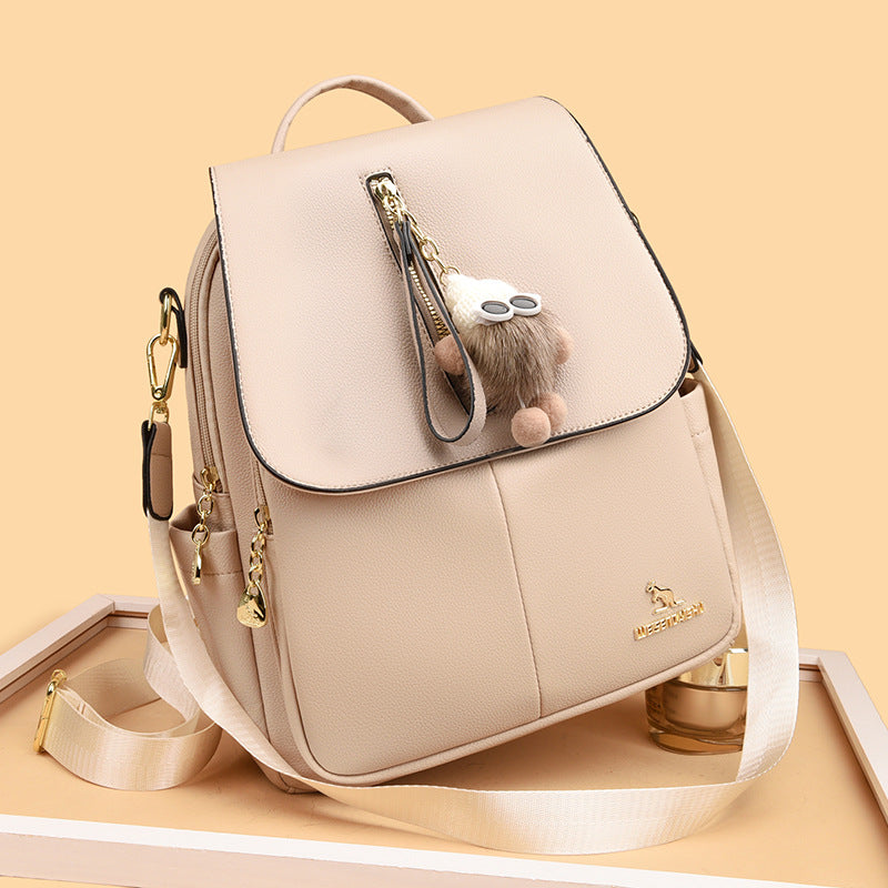 Sac à dos en cuir véritable avec pendentif pour étudiantes