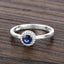 Bague de fiançailles en saphir bleu et diamant de 0,52 carat en or blanc 14 carats