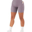 Shorts de sport croisés pour femmes avec ceinture et poches