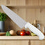 Cuchillo de Chef Premium con Mango Blanco - Biselado o Recto