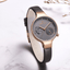 Montre analogique à quartz élégante pour femmes avec bracelet en cuir