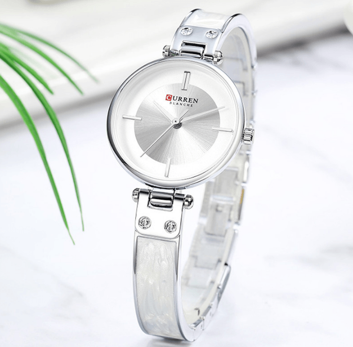 Montre en acier inoxydable élégante pour femmes avec bracelet en céramique