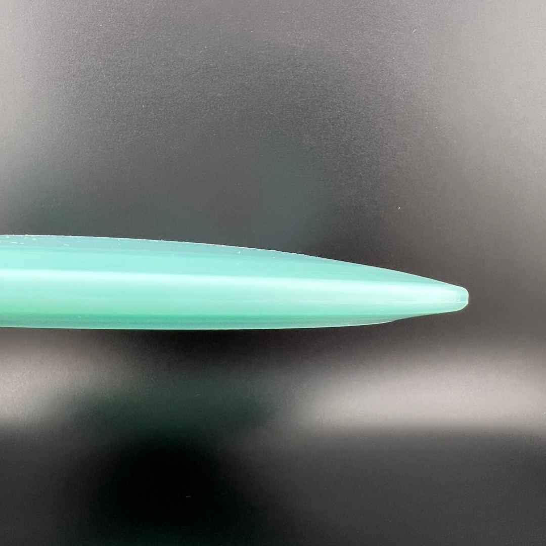 Disque de Golf Disc Primo Color Glow Thread