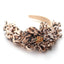 Bandeau à motif floral et feuillage surdimensionné