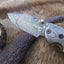Premium Damascus Steel Folding Pocket Knife with Elegant Bone Handle - Korvel