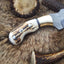 Premium Damascus Steel Hunting Knife – 7.25 Inch Drop Point Blade with Antler Handle and Brass Accents - Korvel