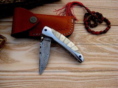 Damascus Steel Folding Knife - Exquisite Bone Handle Design - Korvel
