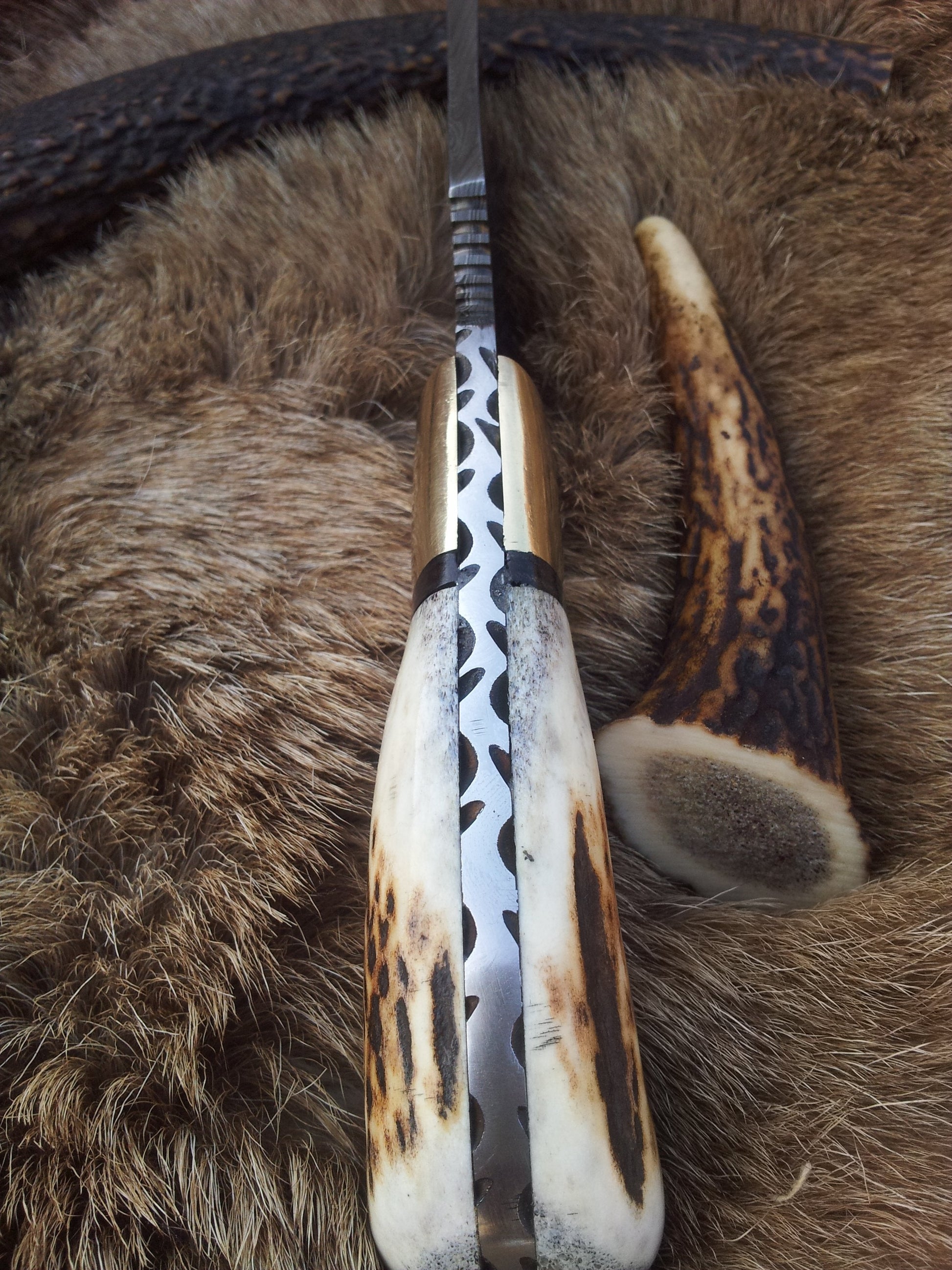 Premium Damascus Steel Hunting Knife – 7.25 Inch Drop Point Blade with Antler Handle and Brass Accents - Korvel