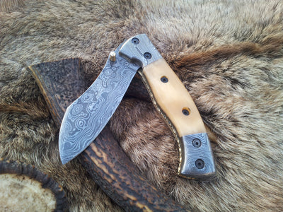 Elegant Damascus Steel Folding Pocket Knife with Bone Handle – BoneShaper - Korvel