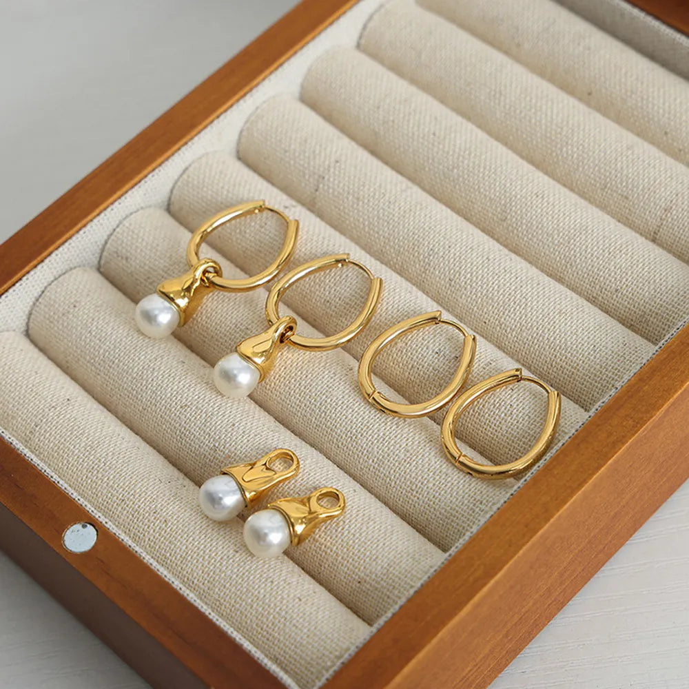 Boucles d'oreilles Huggie en acier titane premium