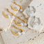 Elegant split design with high gloss pearl inlay simple titanium steel gold-plated earrings - Korvel