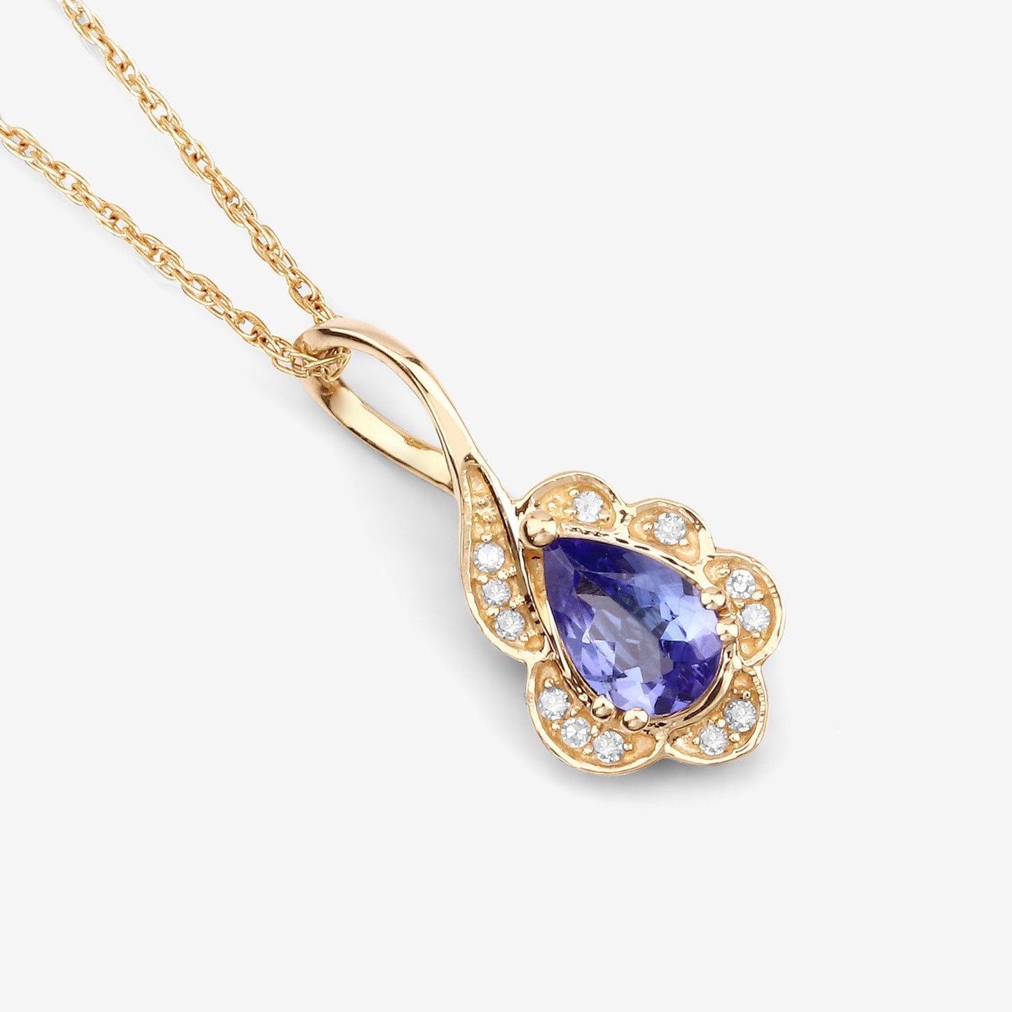 Colgante de Oro Amarillo de 14K con Tanzanita y Diamantes de 0.40 Quilates