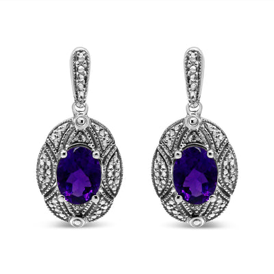 Pendientes de Stud de Acero Inoxidable de Plata .925 con Acentos de Amatista y Diamante