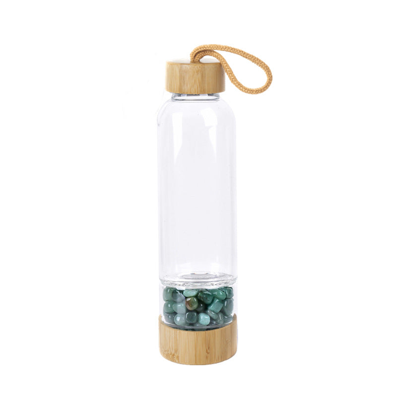 Bouteille d'eau en gravier de cristal naturel